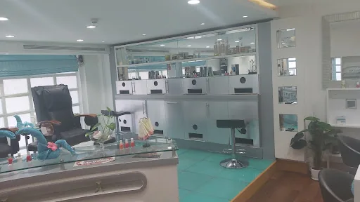 Manicure station and retail shelves at Aroushi Beauty Salon