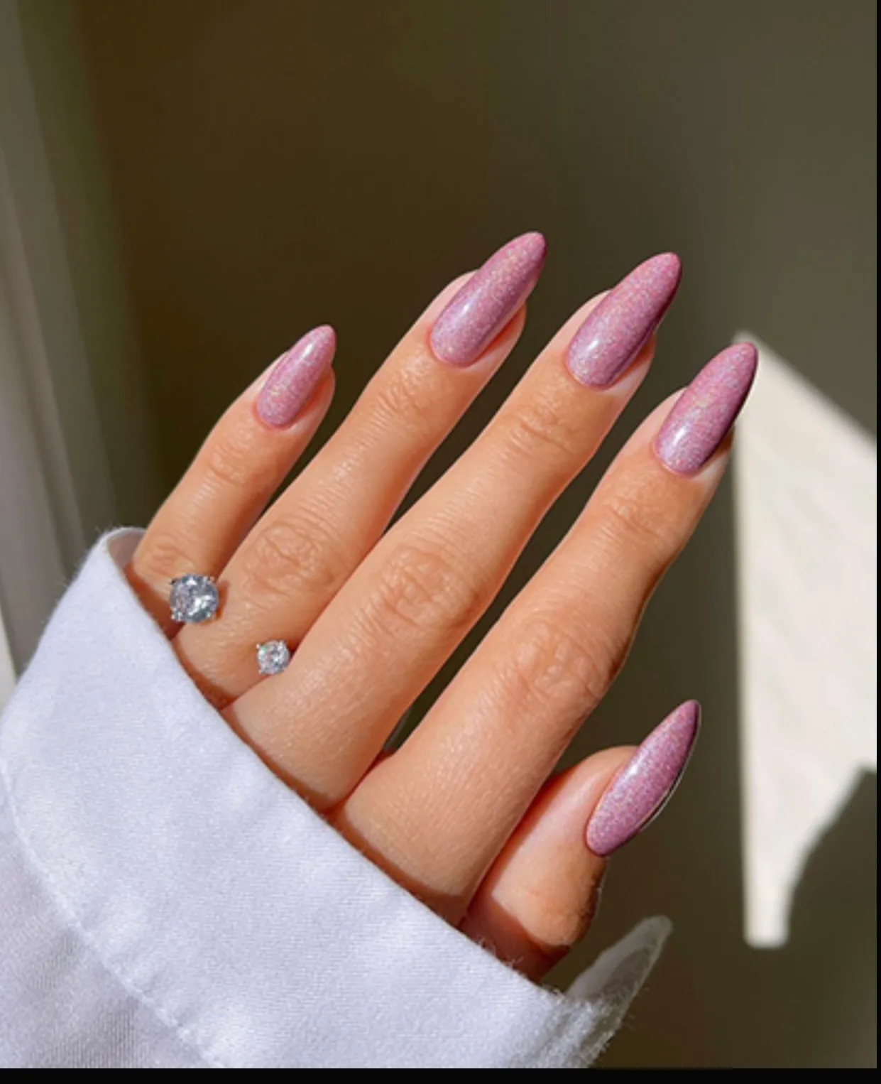 Shimmer pink gel almond nails