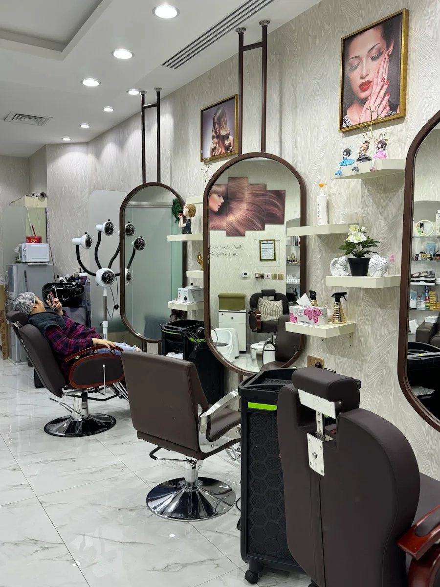 Inside Fine Look Beauty Salon — styling stations with arched mirrors