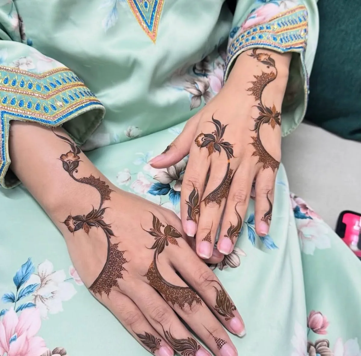 Detailed bridal henna trail drawn freehand