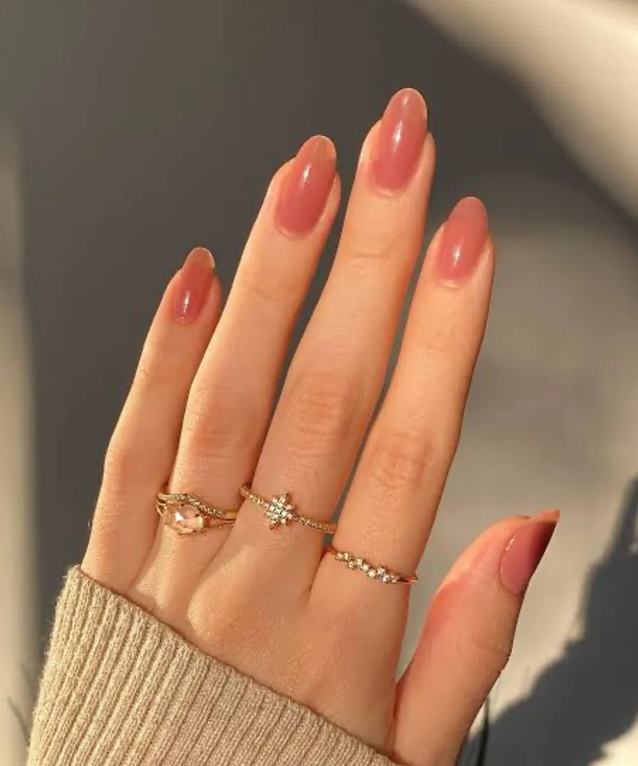 Glossy nude almond nails
