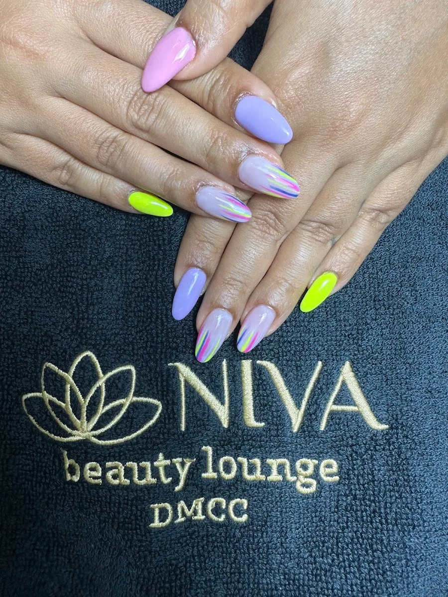 Pastel and neon nails on a branded Niva towel