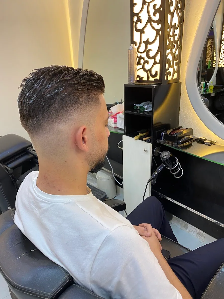 Clean low fade with textured top, side view