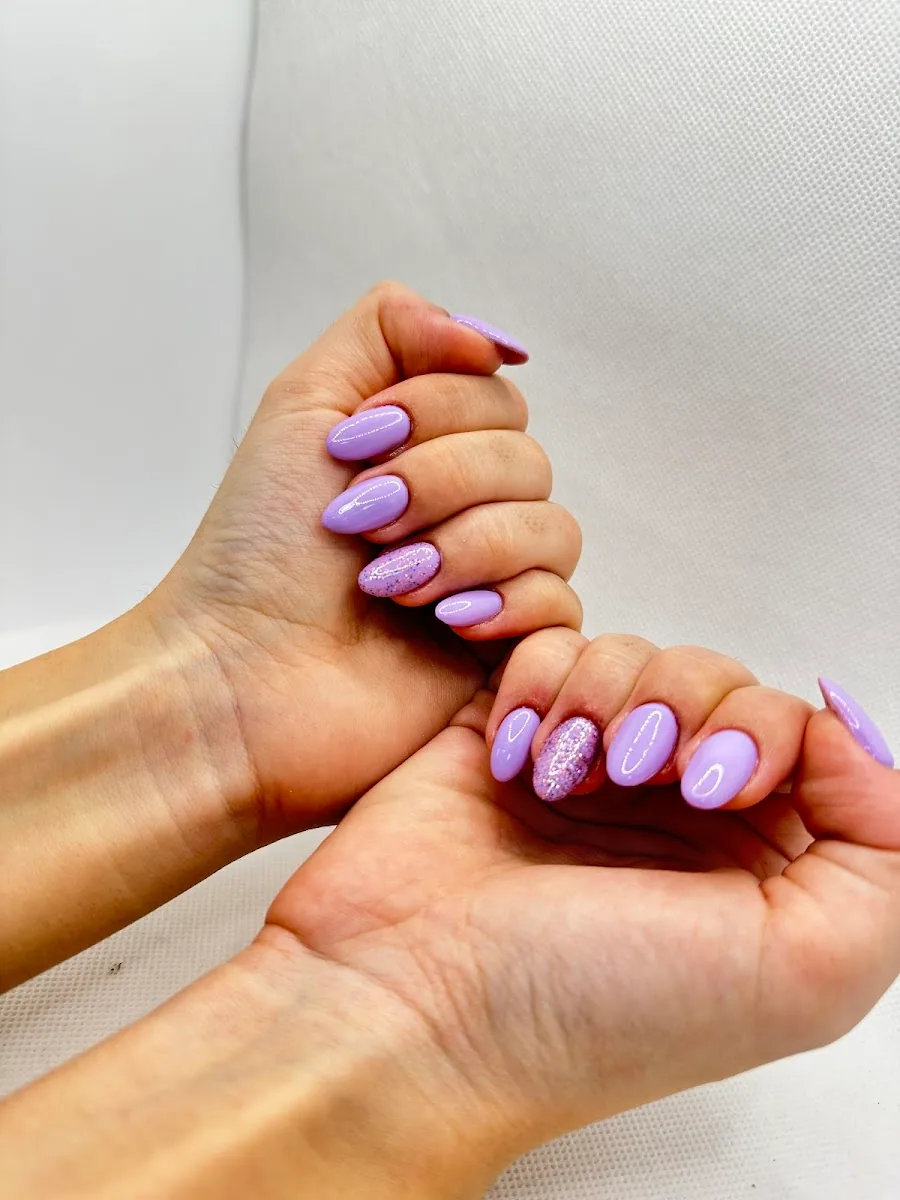 Lilac gel manicure with glitter accent nail