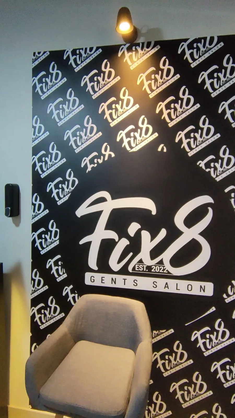 FIX8 branded feature wall with seating