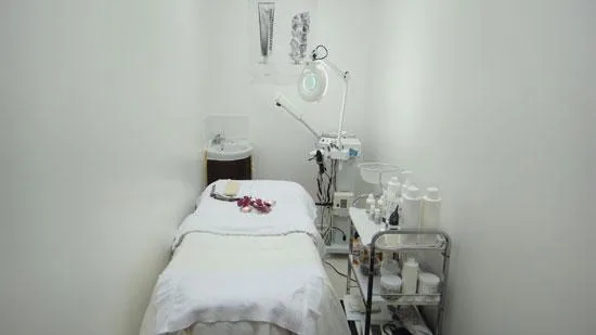 A calm private treatment room set up for facials