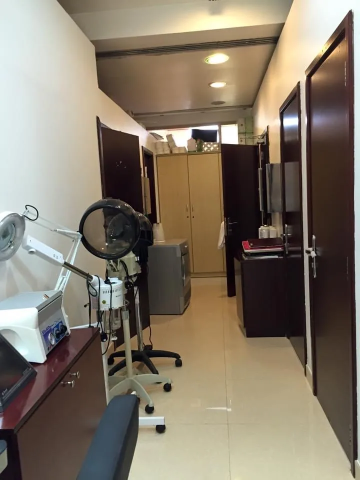 The private treatment-room corridor at the salon