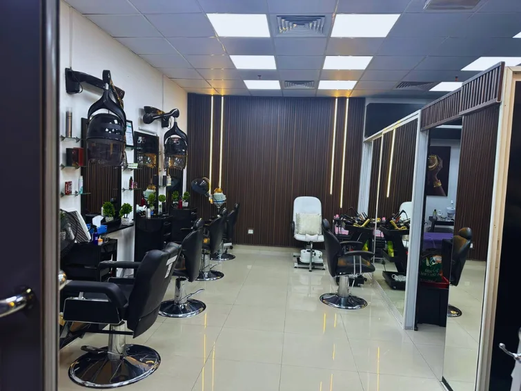Styling chairs and mirrors on the Elegant Essence salon floor