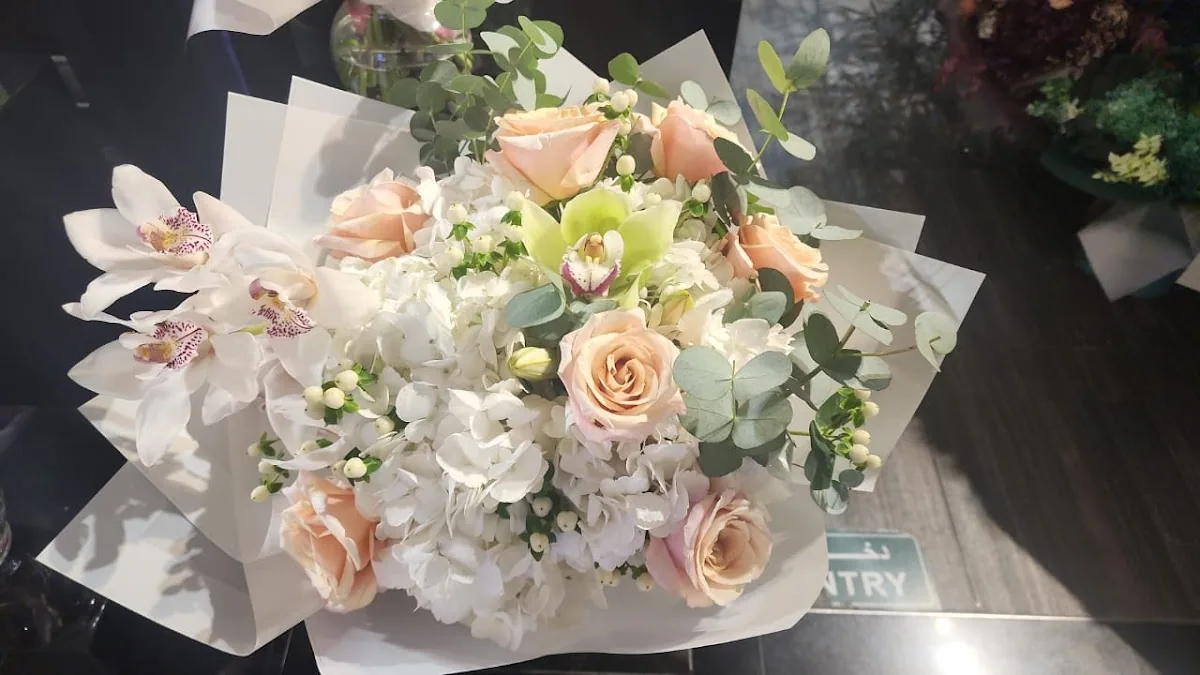 Blush rose and orchid hand-tied bouquet