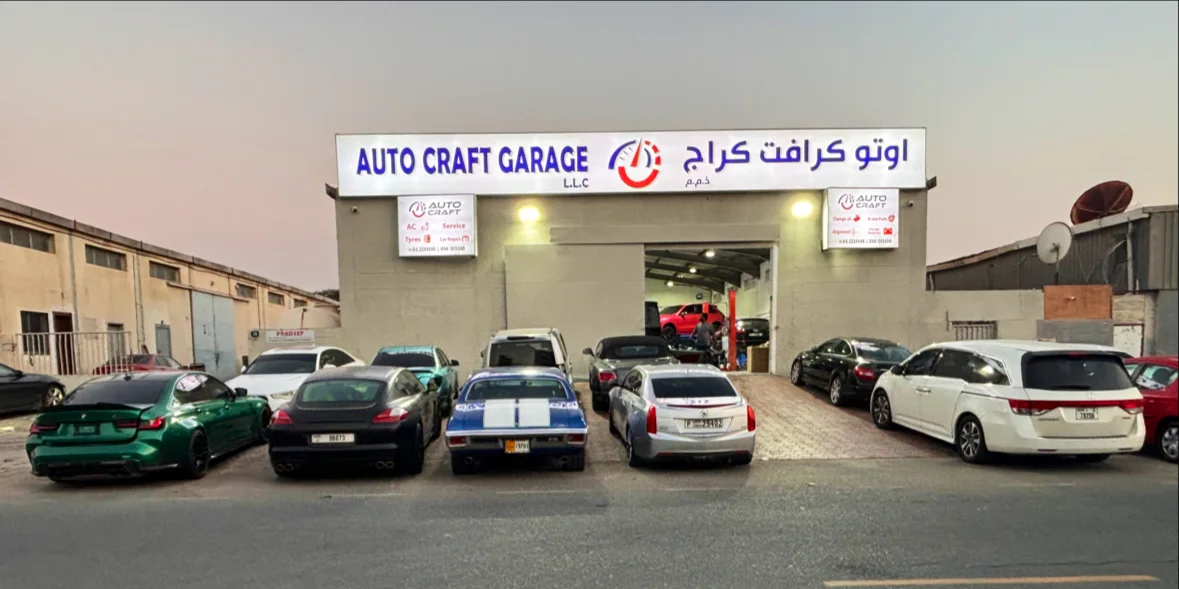 Auto Craft Garage LLC storefront at dusk in Al Quoz, Dubai