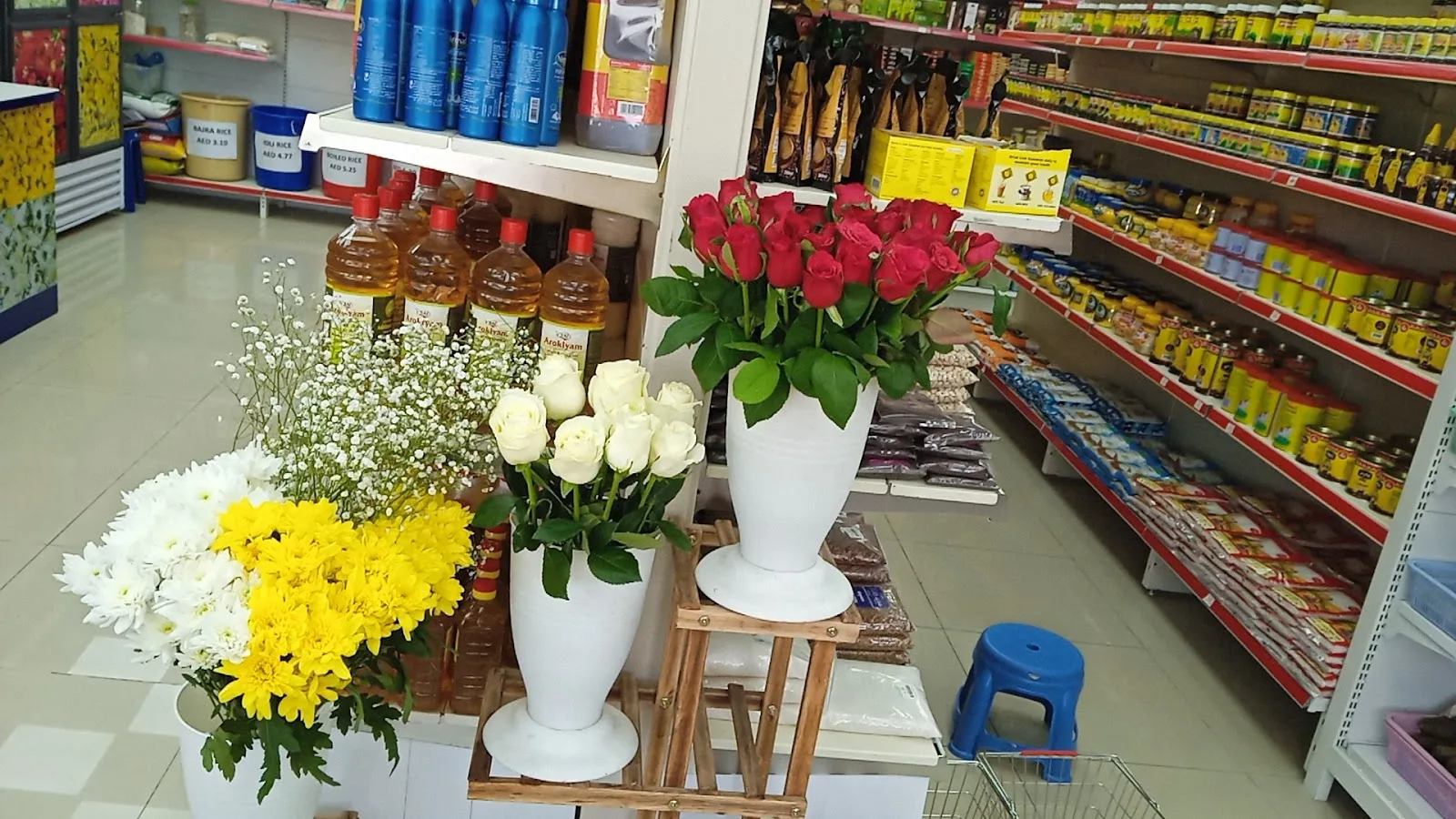 Fresh red and white roses arranged in vases
