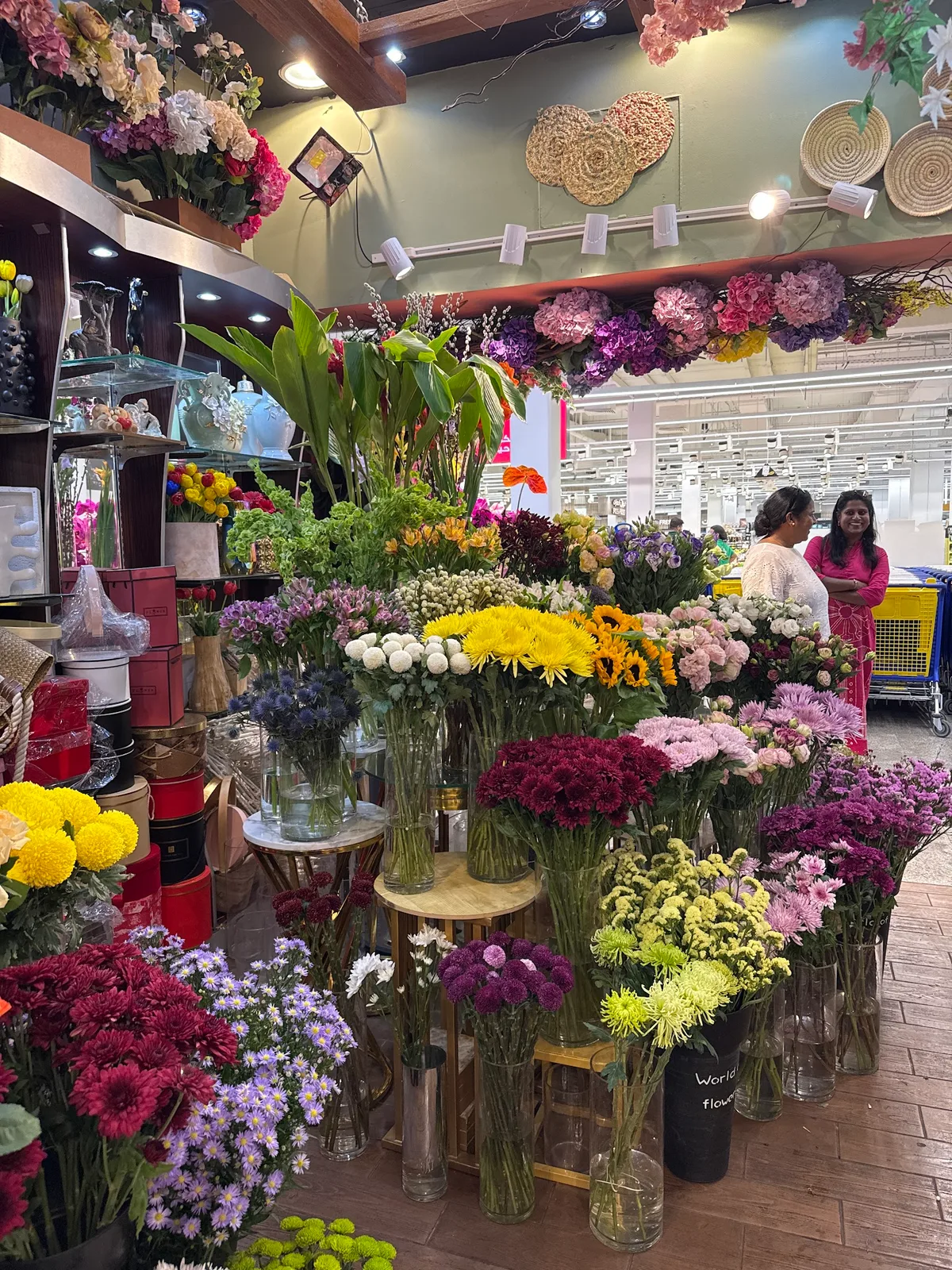Fresh flowers and greenery on display at the Rowdat Al Zuhoor shop