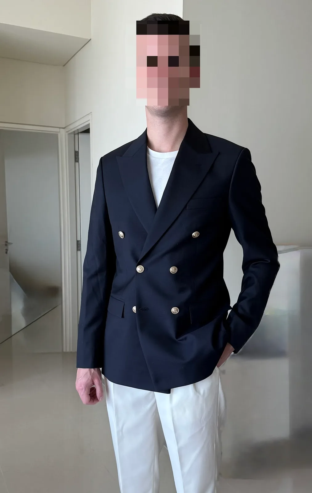 Navy double-breasted blazer with gold buttons, tailored to measure