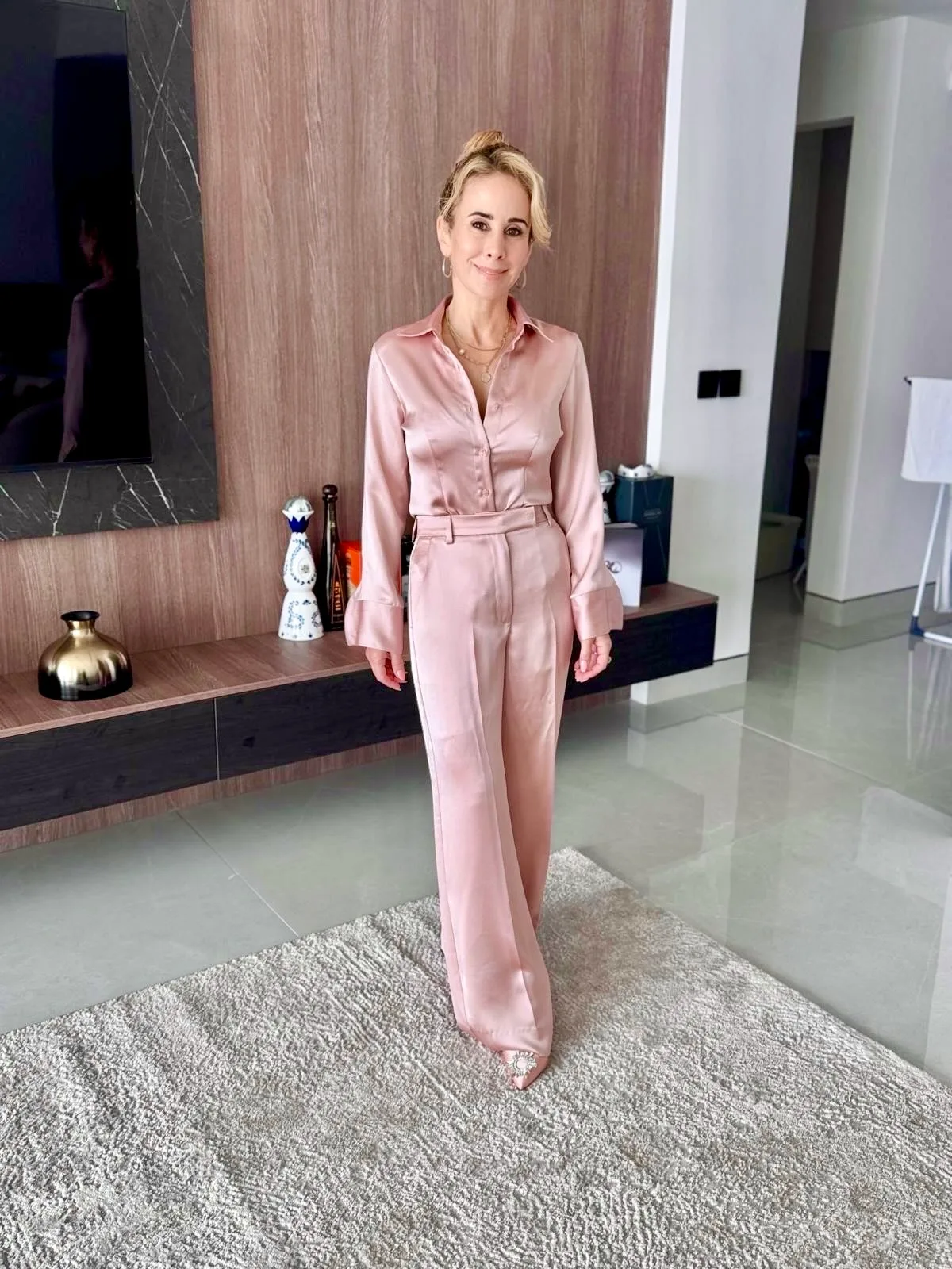 Pale pink satin shirt and wide-leg trousers tailored to measure