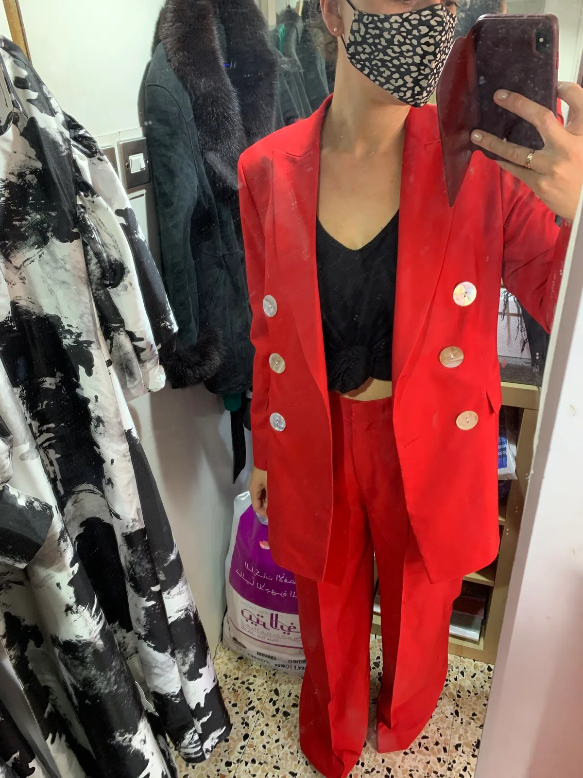 Made-to-measure red double-breasted trouser suit tailored at Al Aryam
