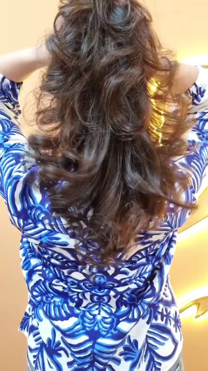 Glossy, freshly styled long hair after a salon treatment