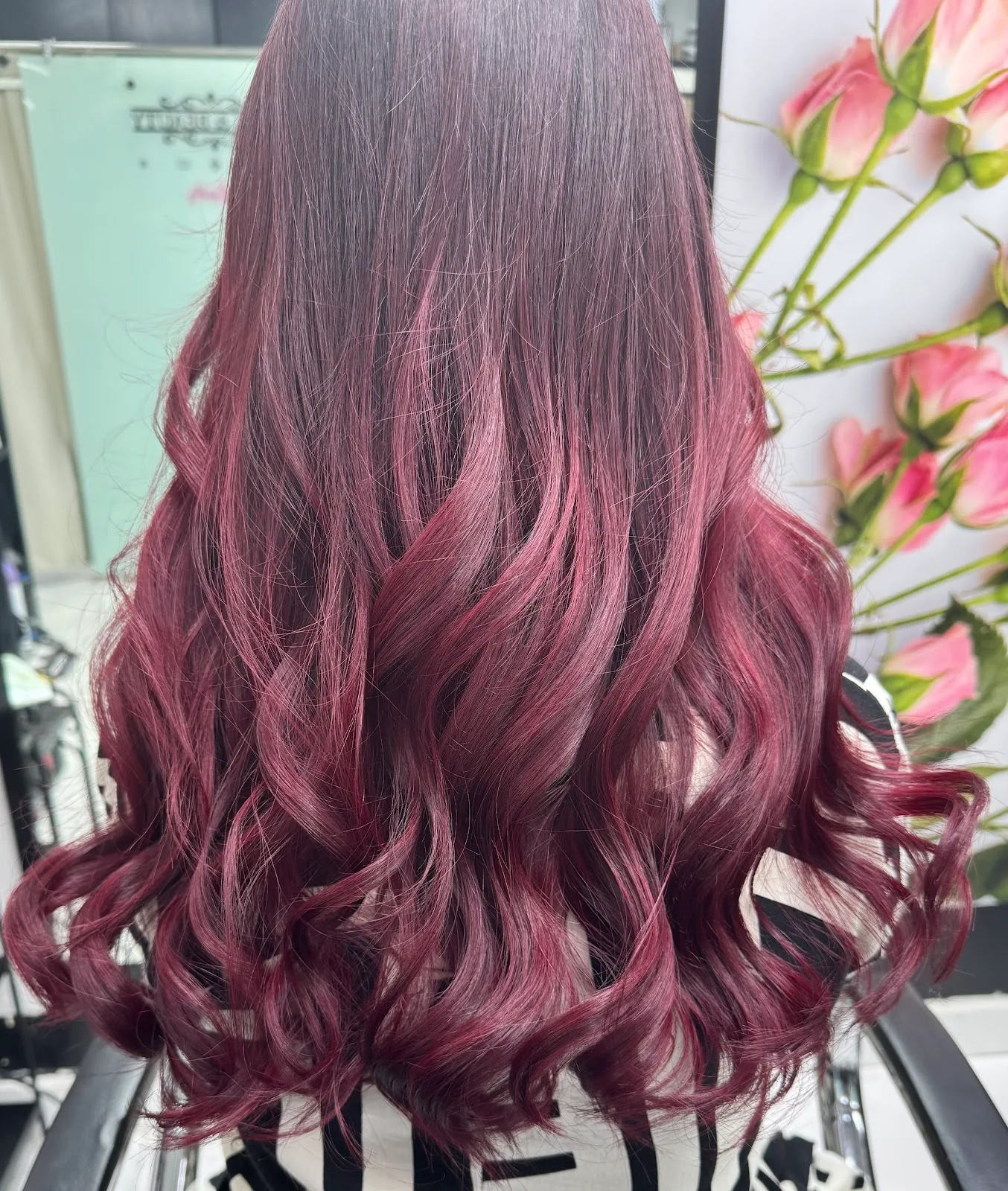 Burgundy coloured curls