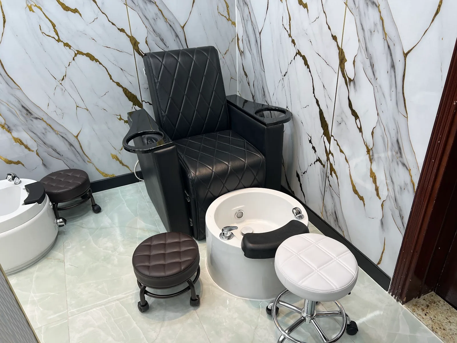 Private spa pedicure corner with marble walls