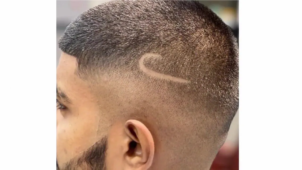 Close crop with carved hair design line and clean fade