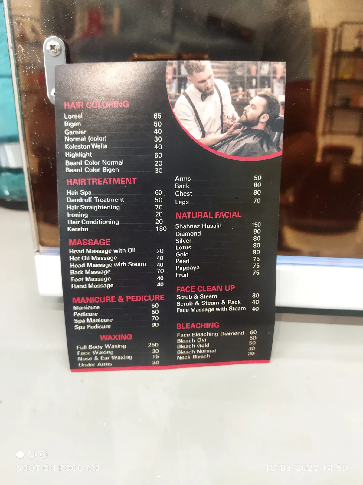 H&B Gents Salon printed service and price board, displayed in store
