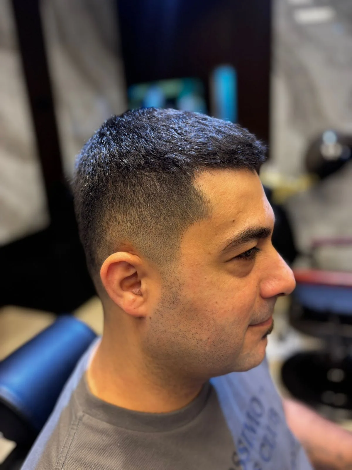 Fresh skin fade haircut finished at Adam Barber