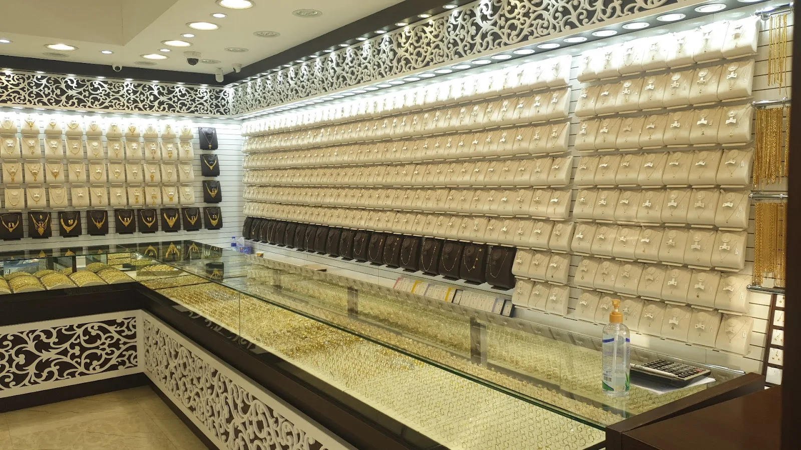 Interior of Evora Gold with walls of gold necklaces and bangles