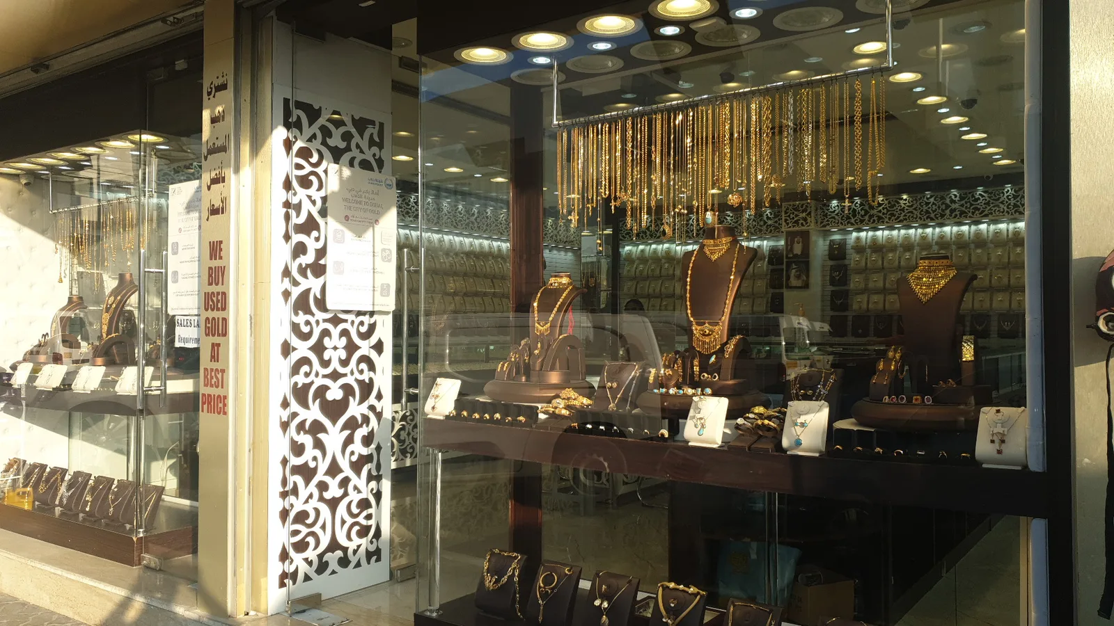 Evora Gold window display with gold chains and necklaces