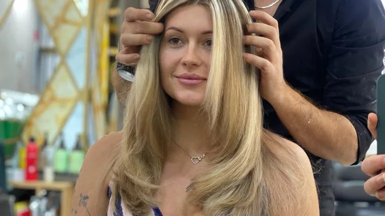 Blonde balayage blow-dry styled at Bella22