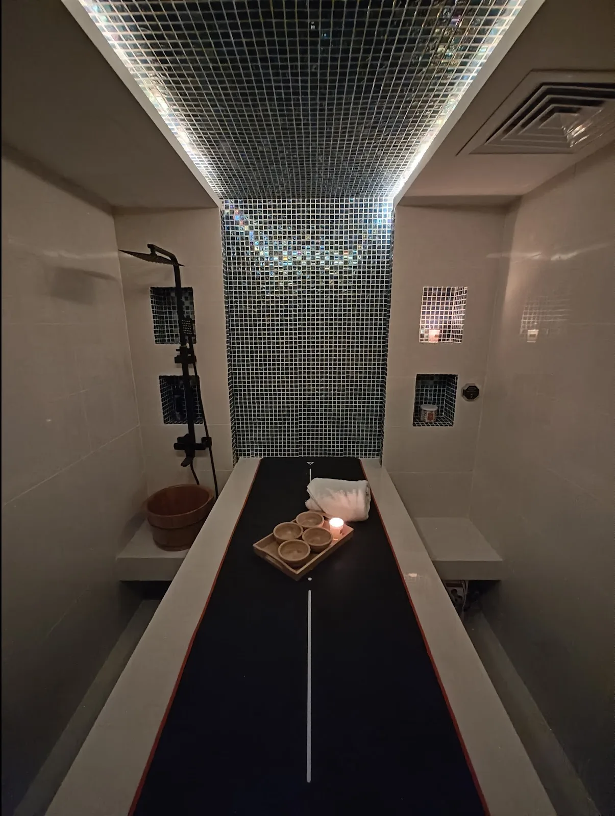 Illuminated mosaic ceiling above the spa treatment bed