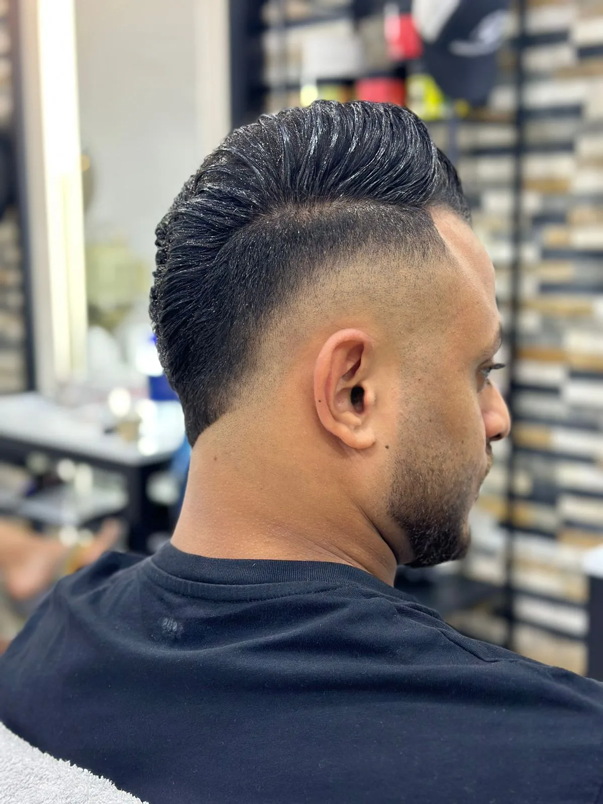 Slick-back with high fade, rear view