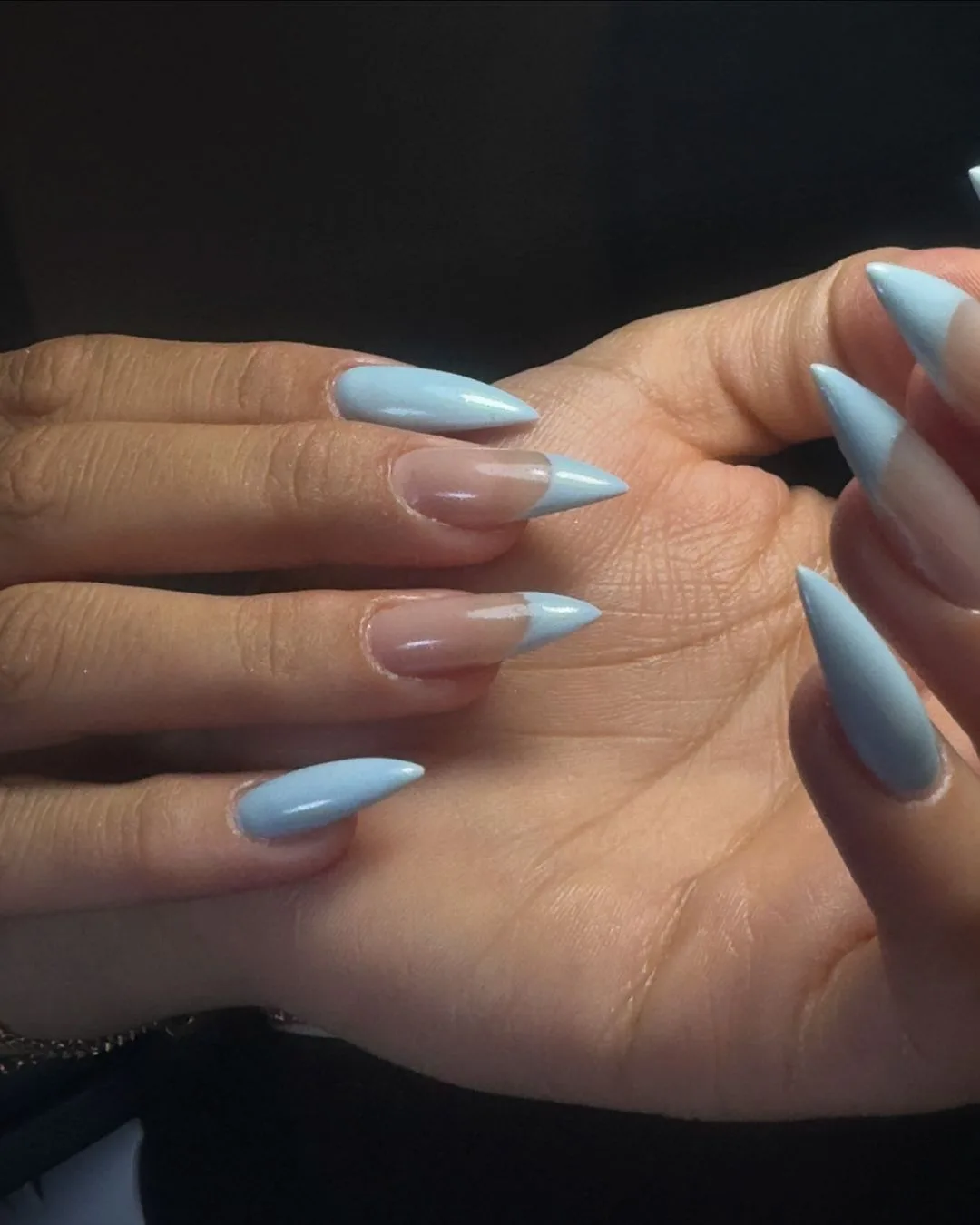 Sky blue stiletto gel nails