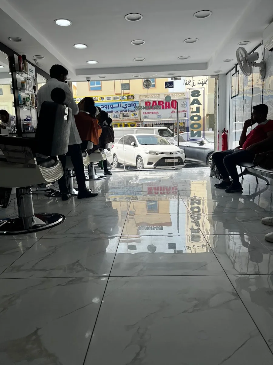 Inside Hair House Gents Saloon looking out toward the street in Hor Al Anz