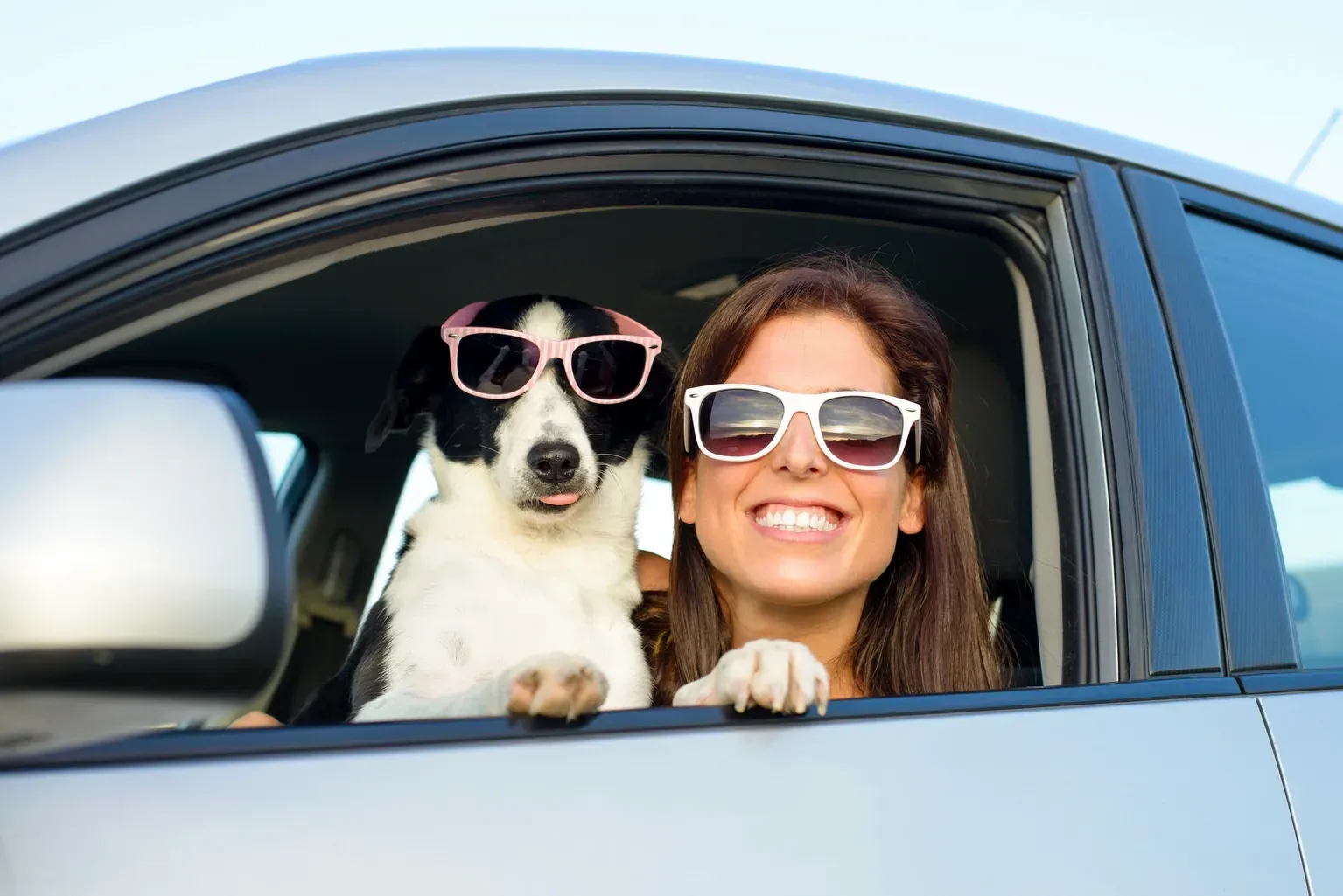 A happy dog and owner — pets leave Pet Moment fresh and content