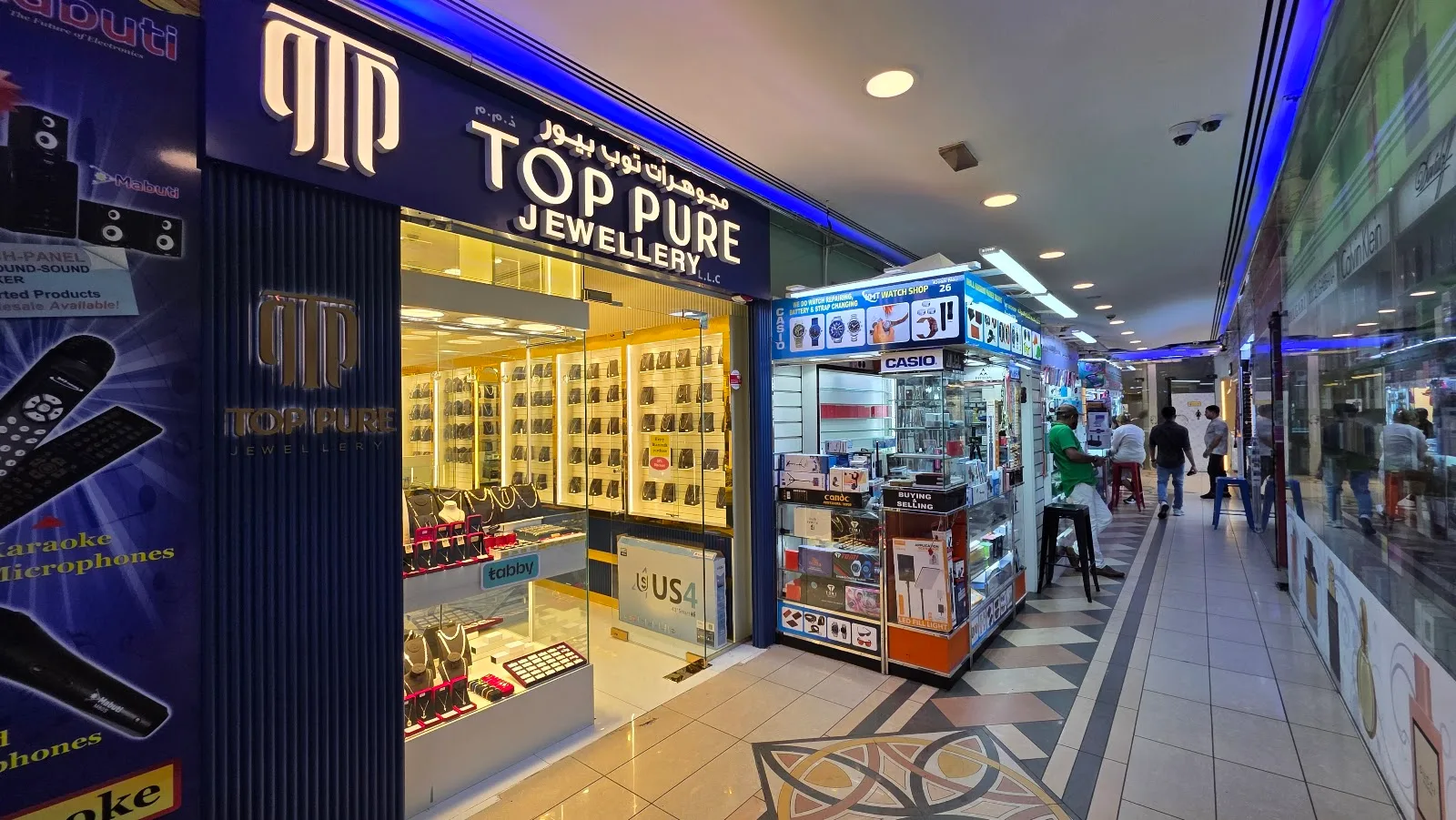 Top Pure Jewellery shopfront along the Al Attar Centre corridor