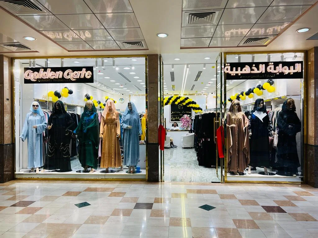 Golden Gate storefront at Al Manal Centre with abaya mannequins in the window