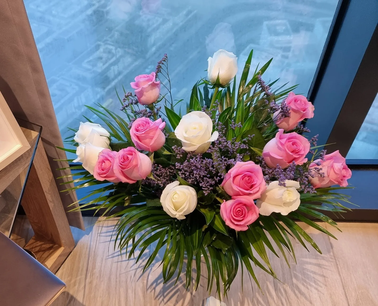 Pink and white rose arrangement made at Plants & Flowers Shop, The Greens
