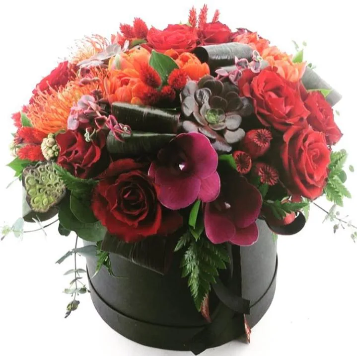 Red roses arranged in a keepsake box
